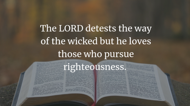 Open Bible with the scriptures from Proverbs 15:9